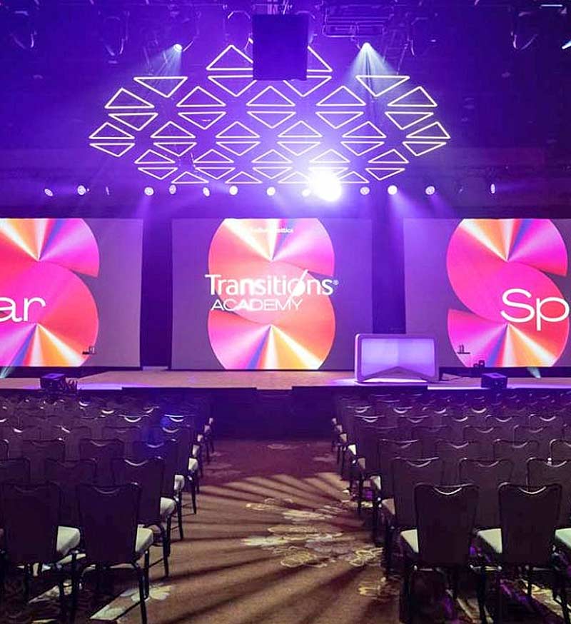 Transitions Academy production stage, signage, lighting and special effects.